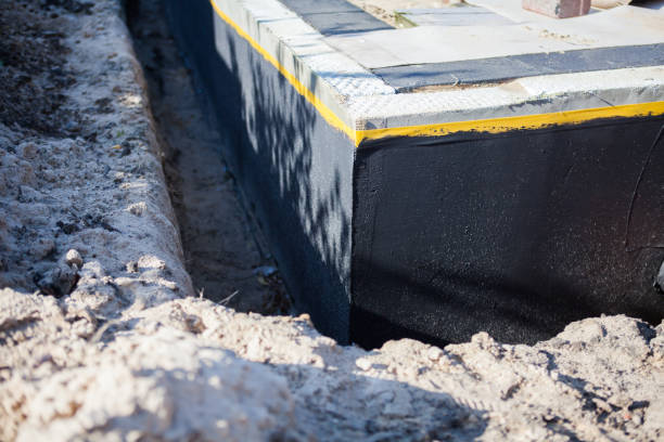 Professional Waterproofing technician working in West Bloomfield, NY